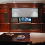 Projector with Motorized Screen over Plasma and Full Surround System